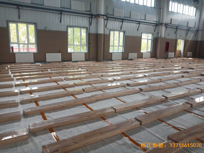 新疆克拉瑪依市獨山子虹園小區(qū)體育館運動地板鋪裝案例
