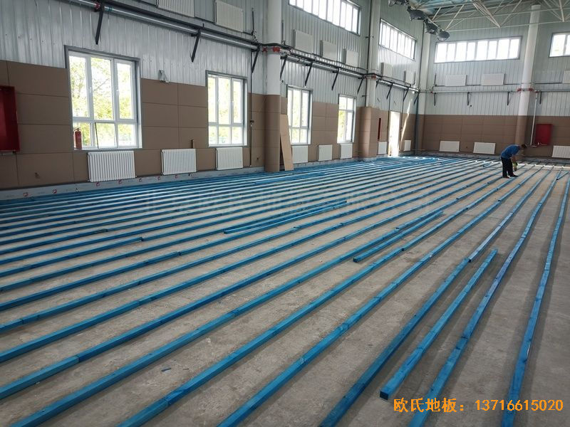 新疆克拉瑪依市獨山子虹園小區(qū)體育館運動地板鋪裝案例