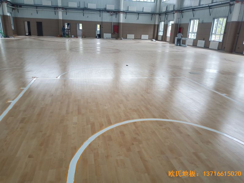 新疆克拉瑪依市獨山子虹園小區(qū)體育館運動地板鋪裝案例
